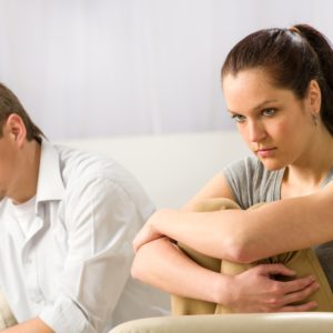 Confrontation Adobestock Unhappy couple sitting silently after argument - not enabling