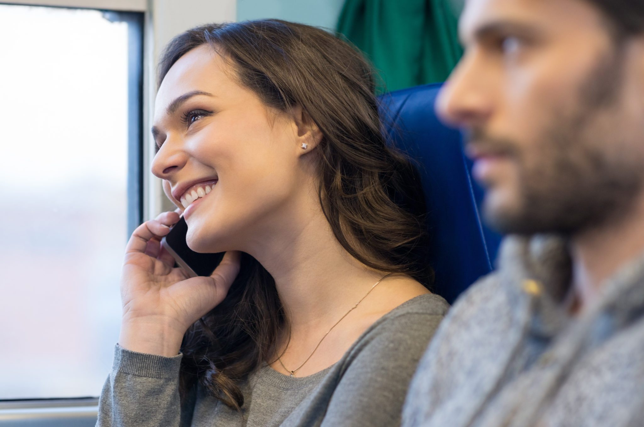 People spend hours talking on their mobile. People talking with Phone. Phone conversation. Talking on the Phone in a Train. Arabic Phone conversation while Replying on Phone for travelers.